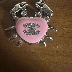 Beautiful pink 🦀 zipper pull!